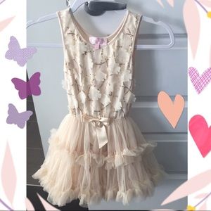 Child cream coloured dress size 5 or 6, used 2x.